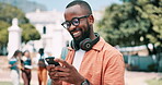 Hands, smartphone and black man typing outdoor, student on campus with communication and headphones. Chat, internet search and contact online for social media, college email or text on mobile app
