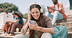 Phone, smile for music and student woman with headphones on steps of campus at university for break. Education, app or dance and young person streaming audio outdoor at college for school scholarship