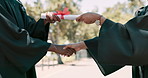 Handshake, certificate and students with graduation, outdoor and university with achievement. People, college and goals with education and support with a diploma and thank you with a degree and award