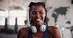 Fitness, face and happy black woman at gym for morning workout, exercise or wellness. Training, portrait and female athlete at a sports center for health, routine or body goals with music headphones