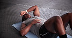 Tired, fitness and black man on the floor, gym and exercise with workout and sports with hobby. Exhausted, wellness center or African person relax after intense training or health goals with progress