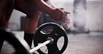 Weightlifting, powder and hands of person in gym for bodybuilder training, intense workout and exercise. Fitness, sports and closeup of athlete with weight equipment for wellness, strength and muscle