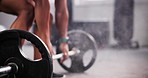 Weightlifting, powder and hands of man in gym for bodybuilder training, intense workout and exercise. Fitness, sports and closeup of person with weight equipment for wellness, strength and muscle