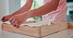 Weaving, hands and cloth of fashion designer, tufting frame and production in a workshop. Closeup, textile and person with fabric, yarn or wool for creative project of artist manufacturing in studio