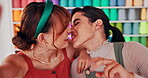 Happy couple, lesbian and kiss for selfie with love, peace sign and lgbt bonding for care in textile store. Women, smile and face with emoji for blog and committed in healthy relationship in portrait