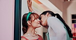Women, lesbian and kiss or connection together in store as employees for bonding or relationship, love or embrace. Female people, diversity and lgbt happiness for hello greeting, homosexual or date