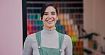 Woman, face and creative employee at workshop for manufacturing fabric for small business, thread or yarn. Female person, entrepreneur and studio or machine in artistic startup, design or product
