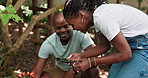 Couple, phone and gardening with fruits identification app, internet and reading of growth information. African man and woman with berries, plants and mobile app for online research and farming blog