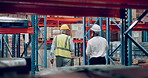 Men, walking and warehouse inspection of package or supply chain logistics for import, storage or distribution. Male people, clipboard and checklist factory or shipping industry, delivery or parcel