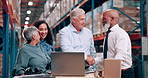 Team, success and laptop with handshake, teamwork and logistics in an industrial warehouse with agreement. Shaking hands, storage, and happy management staff with diversity and project collaboration