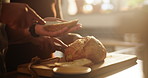 Woman, hands and lesbian couple with bread roll, butter or spread for meal, snack or wheat in kitchen at home. Closeup of female person, LGBTQ or gay people making food or morning breakfast on table