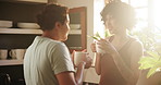 Couple, lgbtq and drinking coffee for bonding, conversation and relaxing or love in relationship. Lesbians, people and speaking on weekend in kitchen, tea and care in partnership and hot beverage