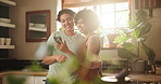 Smartphone , lesbian couple and laughing at meme , social media or funny videos in the kitchen of their home . LGBT , happy girls and bond with joke on cellphone while in kitchen preparing lunch 