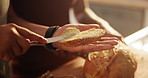 Couple, hands and bread with butter, spread or roll for meal, snack or wheat in kitchen at home. Closeup of hungry people making food in morning for breakfast, bun or healthy nutrition on table