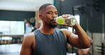 Black man, drinking water and fitness in gym, healthy body and wellness after training. Bottle, thirsty and serious person with liquid beverage for hydration, h2o and nutrition after exercise at club