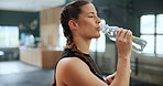 Face, happy woman and drinking water for fitness, healthy body and wellness at club. Gym, bottle and portrait of thirsty person with liquid beverage for hydration, h2o and nutrition after exercise