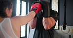 Sports, fitness or boxing with woman and coach at gym for training, practice or spar in preparation for fight. Exercise, health or workout with boxer and personal trainer together for self defense