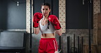 Woman, gym and boxing with fitness, face and practice for a match or training with endurance. Challenge, portrait or boxer with workout or girl in wellness centre or progress with health or energy