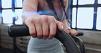 Fitness, spin class and hands of woman in gym for training, intense workout and exercise for health. Sports, cardio machine and person on cycling equipment for performance, endurance and wellness