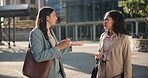 Meeting, discussion and business women in city for planning, conversation and talking on morning commute. Corporate, teamwork and workers in urban town for journey, travel and networking outdoors