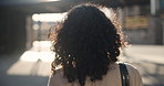 Professional person, back view and walking outdoors for morning travel, journey or commute to workplace. Businesswoman, buildings and daily movement to office, corporate or career for occupation