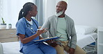 Hospital, black man and nurse with clipboard for health insurance, assessment or exam on bed. Paperwork, questions and mature person with caregiver in consultation for medical advice, test or help