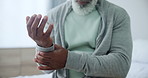 Hands, wrist pain and old man with arthritis, health and carpal tunnel, joint ache and massage muscle. Tension, pressure and inflammation with fibromyalgia, injury or accident with rheumatism