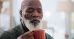 Mature, black man and happy on sofa drink coffee in home, living room and thinking with smile for happiness. Retirement, person and morning on couch with cup in house and peaceful to relax


