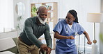 Dancing, happy and nurse with senior patient in living room of retirement home with good news. Healthcare, bonding and African caregiver moving to music with elderly man at medical nursing facility.