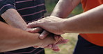 Hands, together for stack and team building with people outdoor, support and solidarity in nature. Community, mission and partnership, trust and commitment with loyalty, group huddle and agreement