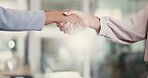 Closeup, business team and handshake for deal, partnership and agreement for collaboration in office on lens flare. People, shaking hands and introduction, welcome and greeting in meeting together