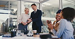 Business manager, shaking hands or applause for award, achievement or trophy for success. Clapping, handshake or reward for winner, congratulations or happy team celebrate promotion in office meeting