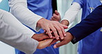 People, nurse and hands together in teamwork for motivation, collaboration or unity at hospital. Closeup of group or medical employees piling for health success or solidarity together at clinic