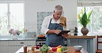 Cooking, research and mature man with tablet for healthy food, nutrition and internet in kitchen. Diet, wellness and home chef with digital app for online recipe, meal prep and dinner tutorial on web