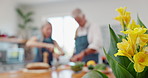 Couple, cooking and kitchen for dinner meal or flowers on counter or healthy nutrition in apartment, bonding or diet. People, preparing and ingredients in home or together for lunch, eating or brunch