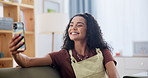 Selfie, happy and woman on sofa in living room with peace sign, silly and goofy face expression. Smile, phone and young female person with photography picture relaxing in modern apartment or home.