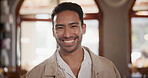 Face, smile and man at restaurant to relax, leisure and positive facial expression at coffee shop in Mexico. Portrait, happy person and customer in cafe laughing, excited and cheerful at cafeteria