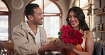 Happy, roses and couple on date in restaurant for valentines day, anniversary or romantic celebration. Love, conversation and young man and woman with bouquet of flowers at dinner or lunch at cafe.