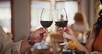 Cheers, glasses and people with wine in hands at restaurant for date, celebration and anniversary dinner. Luxury, alcohol and fine dining couple drink together on holiday or vacation with a toast