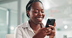 Businesswoman, phone and happy with typing for communication, networking and mobile chat in office. Black person, employee or smartphone with text message, smile or internet conversation at workplace
