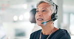 Call center, woman and happy with communication and customer service with telemarketing and headset. Consultant, mature person and helpdesk operator with discussion, microphone or crm support at work