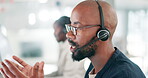 Call center, businessman and consulting with communication and telemarketing for customer service and headset. Consultant, black man and helpdesk operator with discussion, microphone and crm support