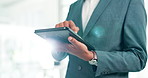 Businessman, tablet and hands typing for research, social media or communication at office. Closeup of man or employee with technology in online search, networking or browsing and scroll at workplace