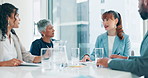 Business people, corporate and meeting for planning, teamwork and reviewing ideas for project management in boardroom. Colleagues, diversity and sitting for discussion, collaboration and partnership