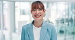 Face, happy and business woman in company, office or workplace to work on career. Portrait, employee and smile of professional lawyer, consultant and female attorney laughing in suit in Spain for job