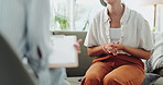 Closeup, woman on a couch and therapy with conversation, healing and trauma with questions and clipboard. Closeup, person and client with a counsellor and writing for diagnosis and anxiety with paper