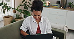 Remote work from home, woman and laptop with typing, connection and creative project in a lounge. Person on sofa, entrepreneur and freelancer with computer or business owner with internet or research