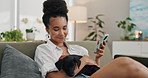 Phone, search and happy woman with a dog on sofa for social media, relax or reading at home. Smartphone, pet and female person in a living room with puppy, bonding or comfort while texting in house