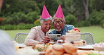 Senior, couple and happy with video call at birthday party for celebration, laughing and memories in garden. Elderly, man and woman with smartphone for photography, gathering and event in backyard