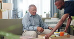 Senior, woman and nurse or breakfast with support, conversation and caregiver in living room of retirement. Elderly, person and black man with kindness, happiness and discussion while serving a meal